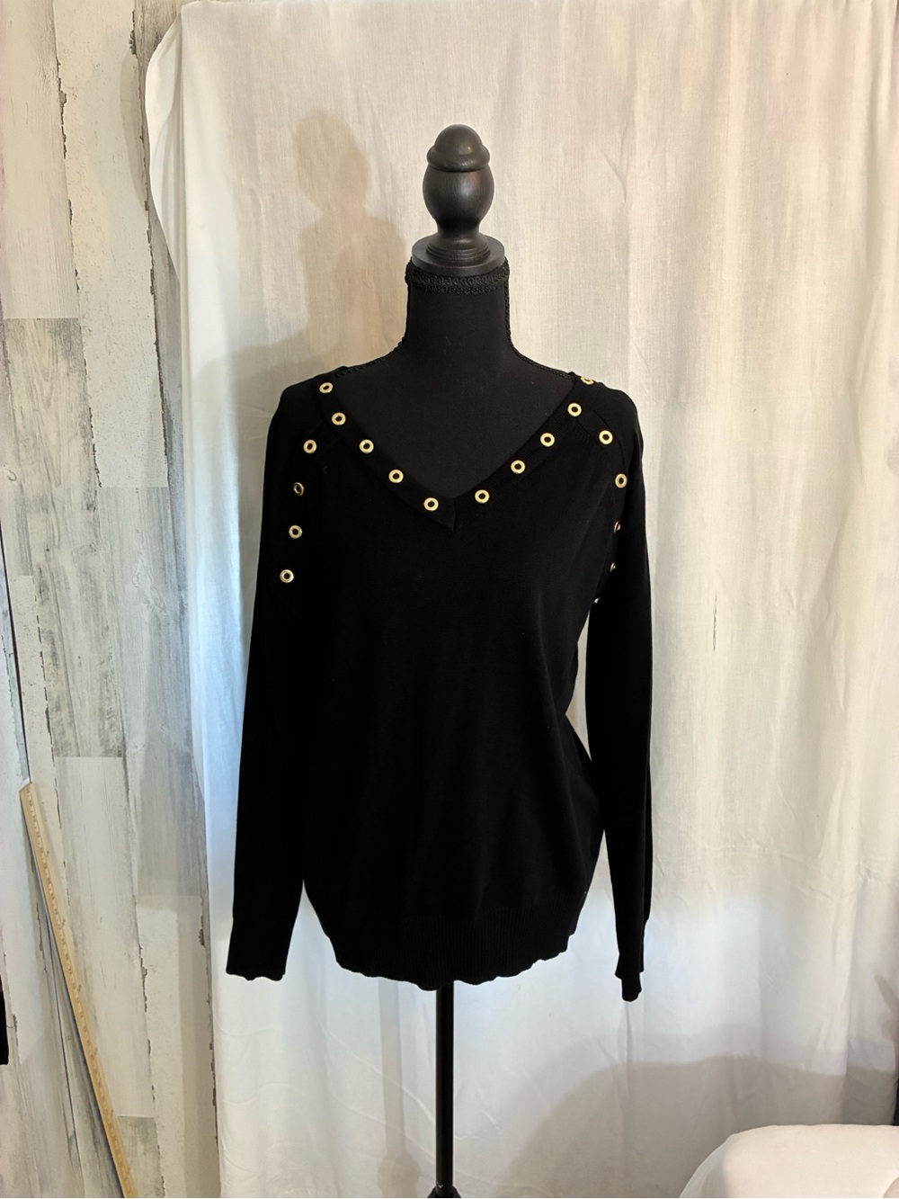 Black V-Neck Sweater with Gold Grommet Detail